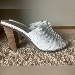 Beautiful white woven heeled sandals. Sm 1 cm ding left inside heel.